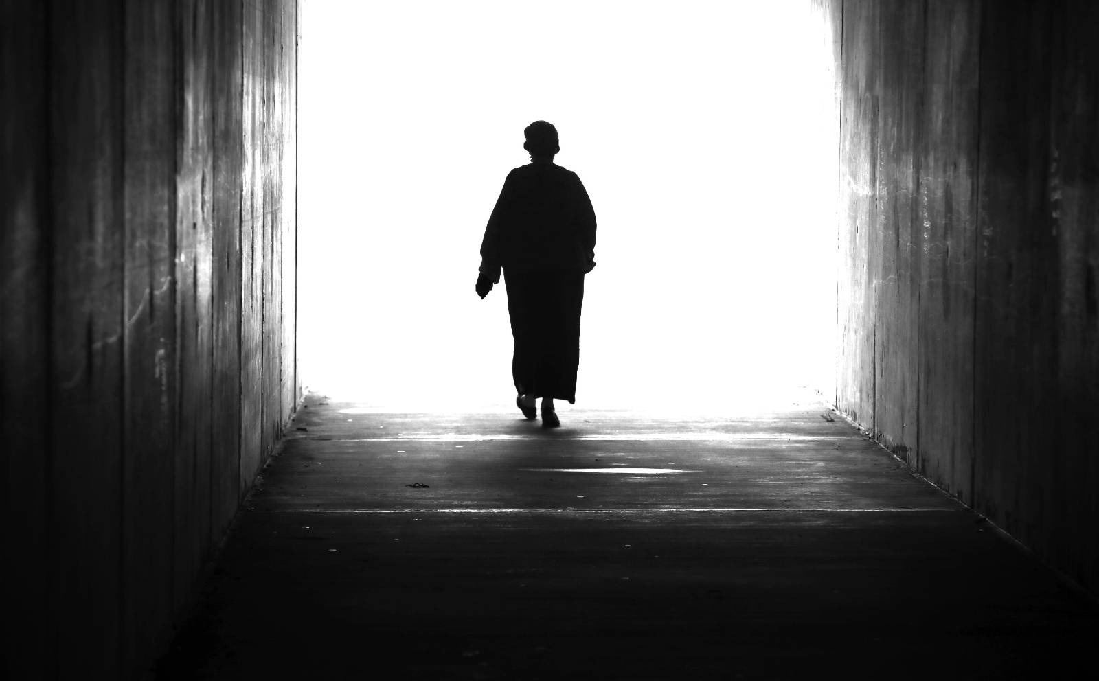 Walking into a tunnel. 