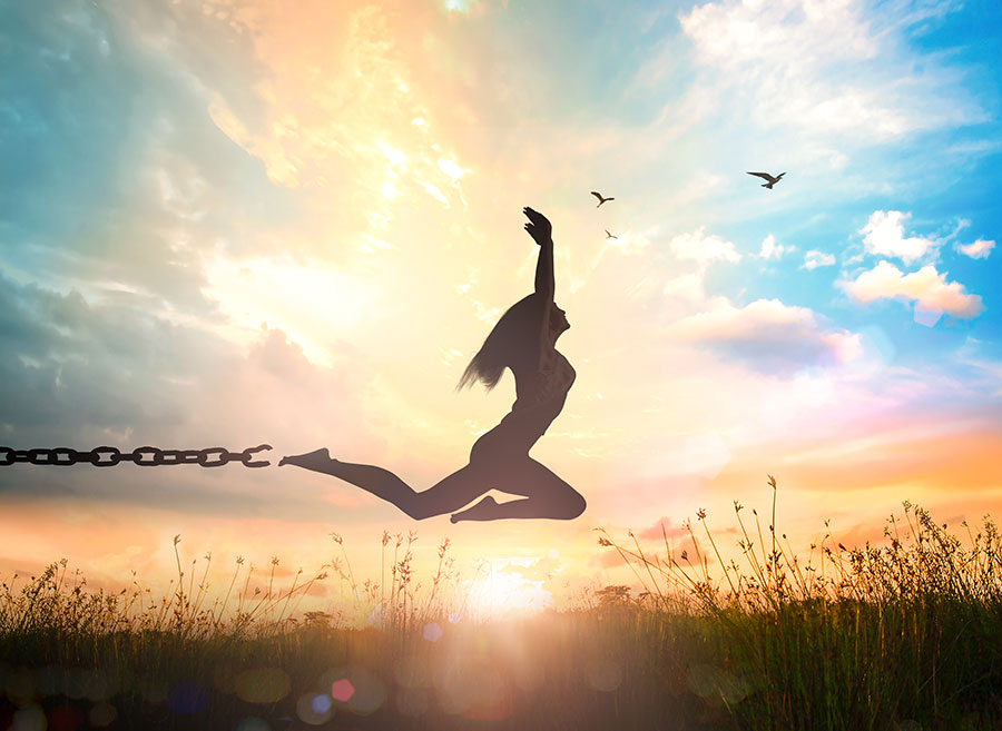 Forgiving: A woman breaking free from her chains through forgiveness