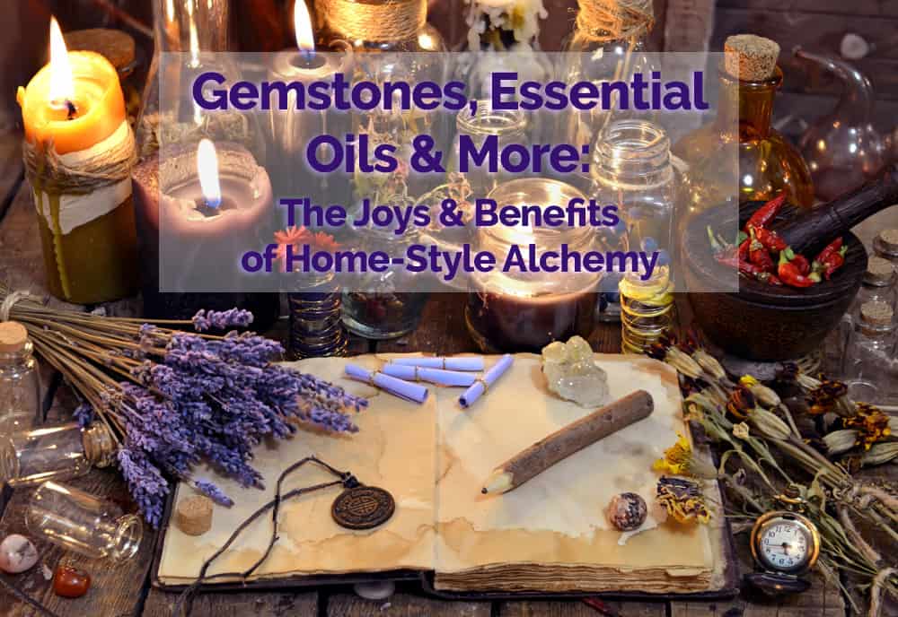 Gemstones, essential oils and herbs on a table for esoteric alchemy