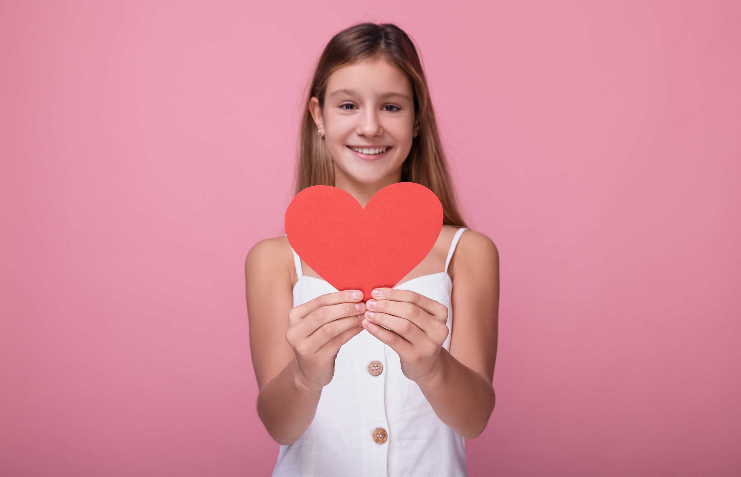 Girl holding heart