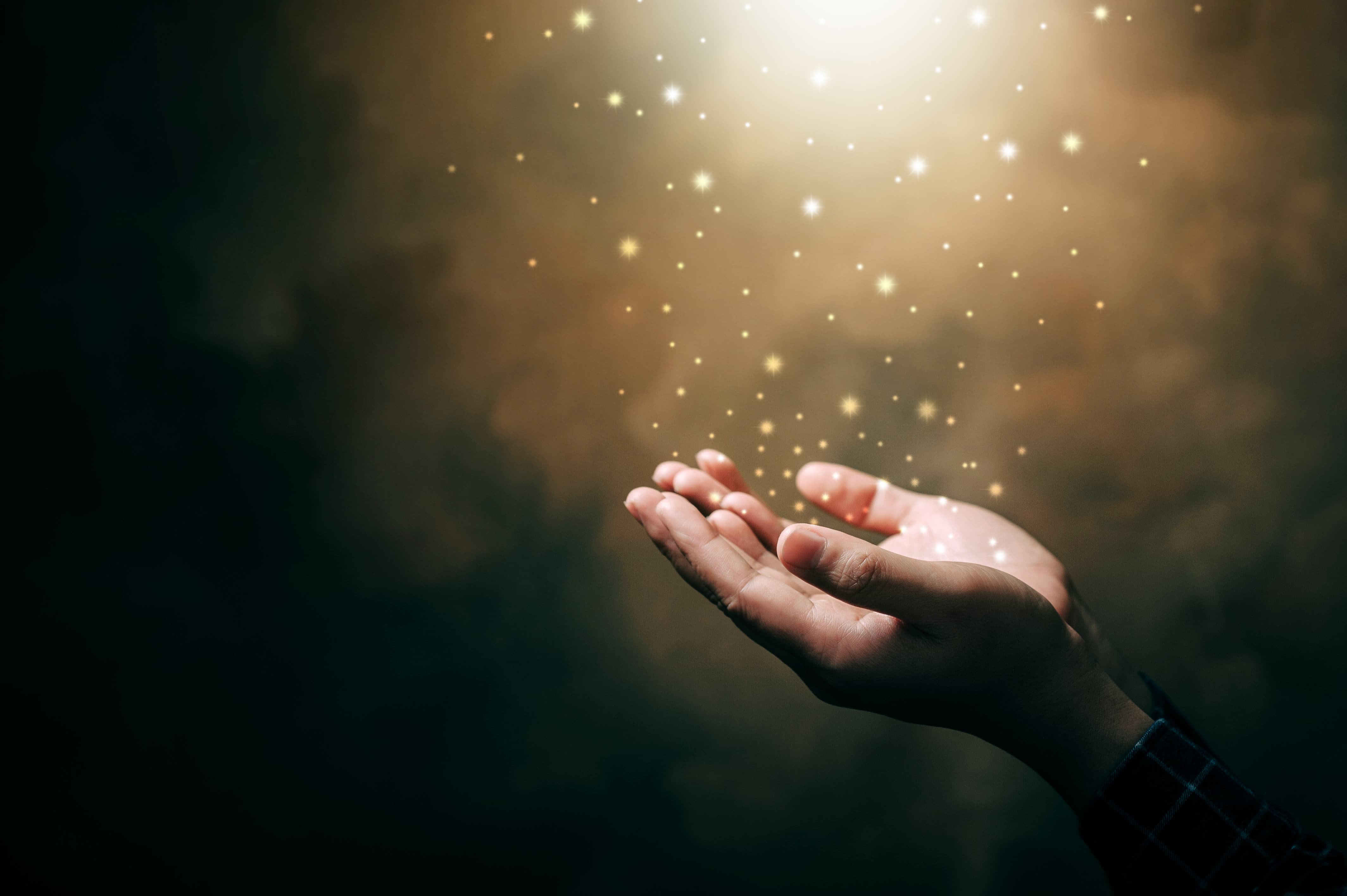Hands releasing light — symbol of conscious business, spiritual entrepreneurship, and sacred commerce