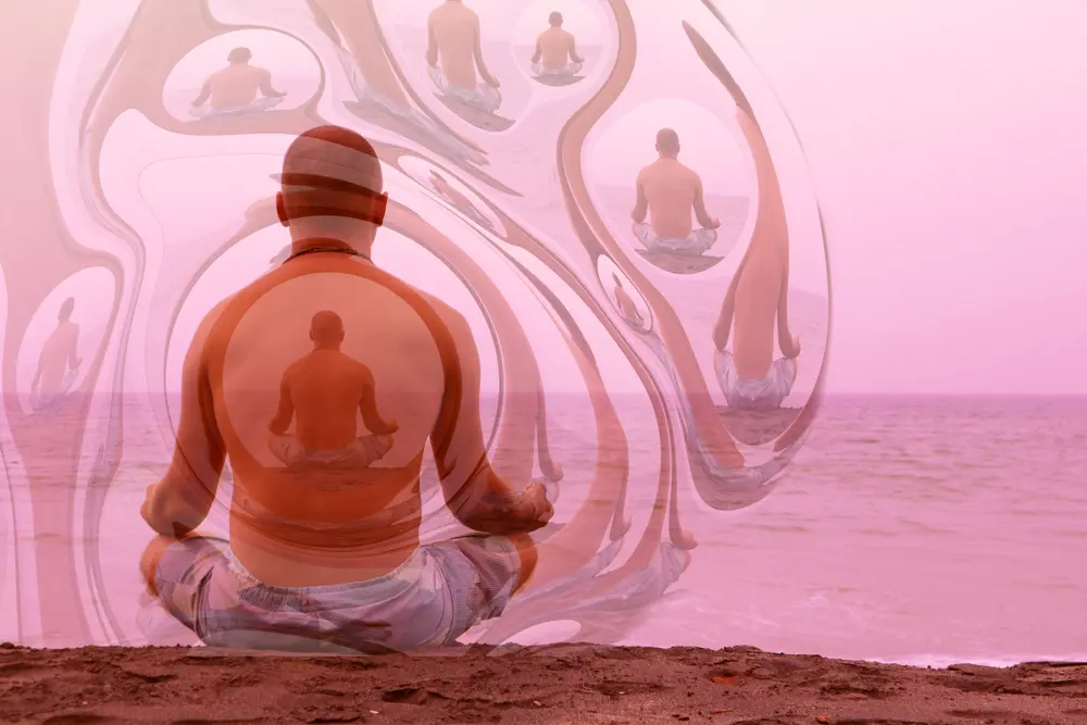 Person meditating alone in nature seeking Samadhi and enlightenment