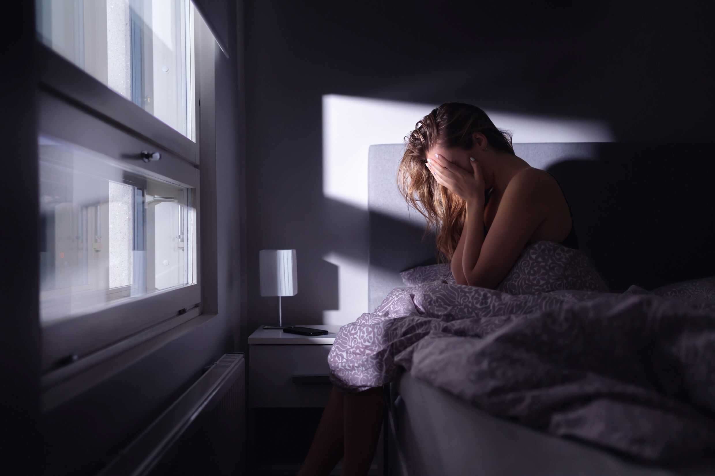 Image of woman struggling with anxiety to convey natural remedy for panic attacks and anxiety - Paul Wagner